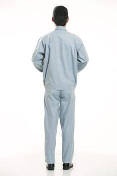 The young engineer various occupation clothing standing in front of a white background