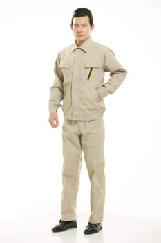 The young engineer various occupation clothing standing in front of a white background