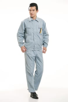 The young engineer various occupation clothing standing in front of a white background