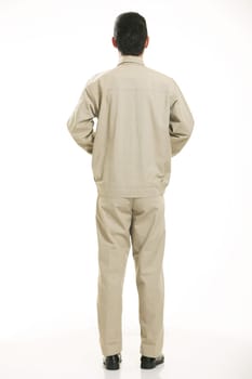 The young engineer various occupation clothing standing in front of a white background