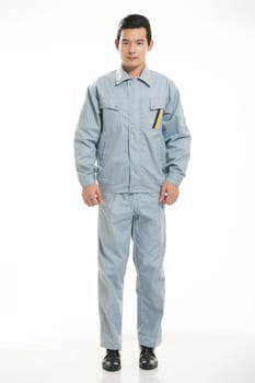 The young engineer various occupation clothing standing in front of a white background