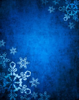 .Christmas blue background with white snowflakes