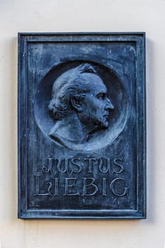 GIESSEN, GERMANY - 2021_04_09: Bronze plaque from Justus Liebig. Justus von Liebig (1803-1873) chemist, scientist.