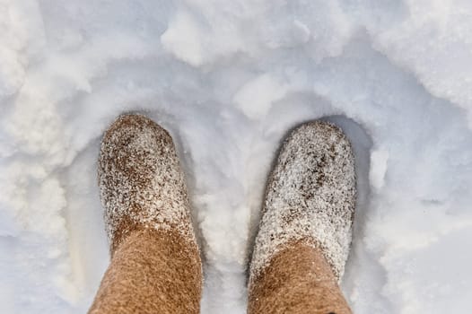 Russian boots in the snow on a cold winter day. High quality photo
