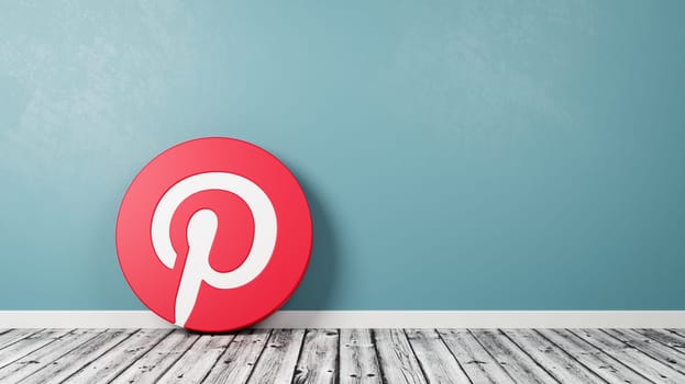 Pinterest Logo 3D Symbol Shape on Wooden Floor Against Blue Wall with Copy Space 3D Render Illustration
