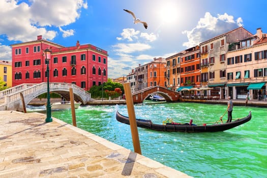 Venice canals, gondola and medieval bridges, beautiful view of Italy.