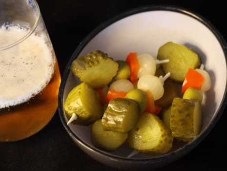 typical Spanish aperitif accompany pickle beer olives pepper