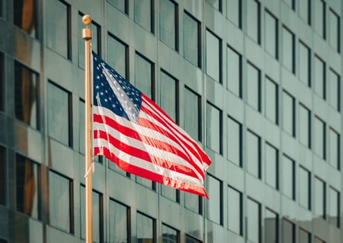 USA american flag and modern building in background