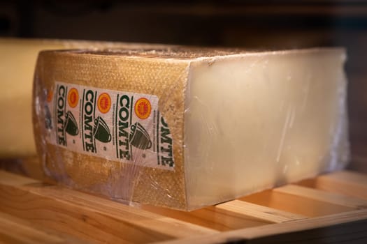 December 3 2021, Lyon, Rhone Alpes Auvergne, France : Comte famous cheese from Jura wheel in a ripening cellar