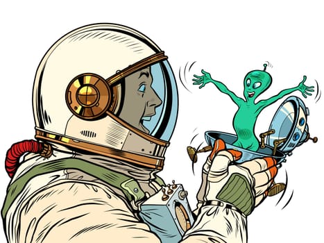 A surprised male astronaut looks at an alien in a festive UFO flying saucer box. Pop Art Retro Vector Illustration 50s 60s Vintage kitsch Style