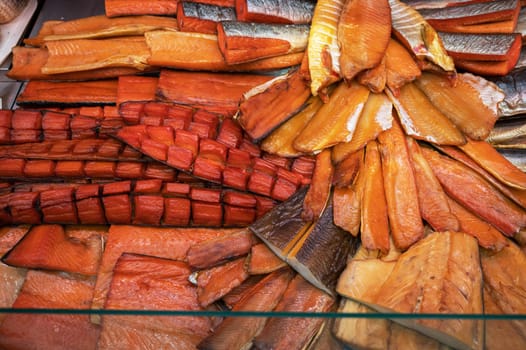 Various smoked fish products. Healthy eating and fish market concept