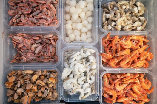 Frozen Seafood in fridge at the fish market. Healthy eating and fish market concept