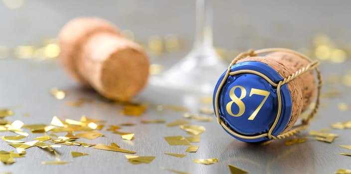 Champagne cap with the Number 87