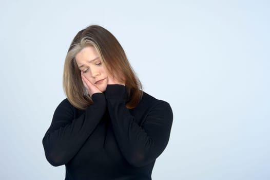a very sad woman in a black turtleneck. High quality photo