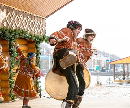 KAMCHATKA, RUSSIA - DECEMBER 24, 2021: Folk ensemble performance in dress of indigenous people of Kamchatka.