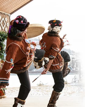 The Folk ensemble performance in dress of indigenous people of Kamchatka. Selective focus