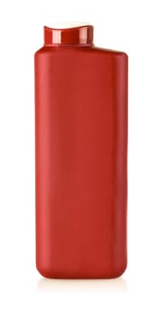 The red plastic shampoo bottle isolated on a white background