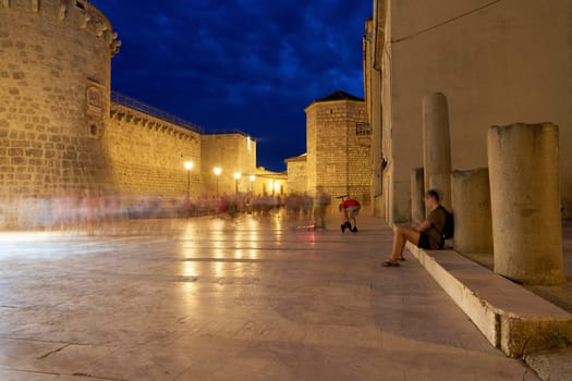 Kamplin square in the historic old town of Krk in Croatia in the evening