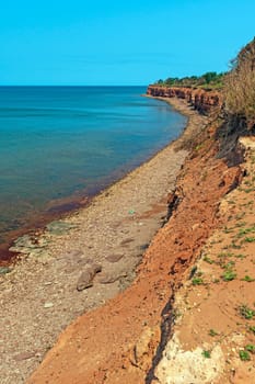 Red Rock Coastline at Low Tide on North Cape on Prince Edward Island in Canada