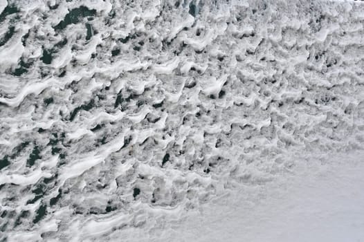 Fence covered with snow and ice. High quality photo
