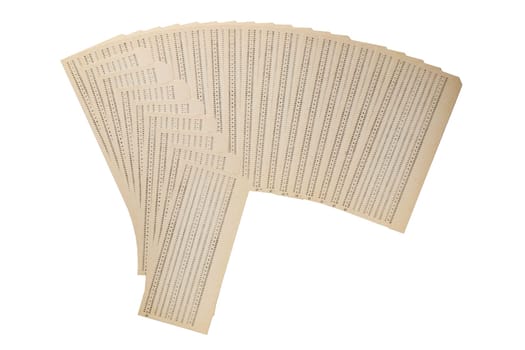 Punch cards. Close-up of a pile of unused vintage computer punch cards isolated on a white background. Technology in the sixties and seventies for data storage and programming. Macro.
