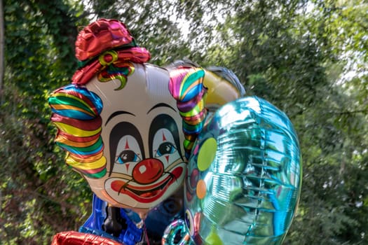 Beautiful colorful flying balloons for children like a clown and other characters for birthdays, children's day and other celebrations.