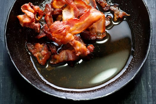 close up of a pan of rendered bacon fat flavoring ingredient