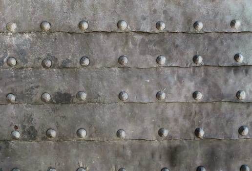 Rustic metal texture with old nails