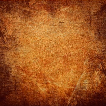 Grunge brown leather texture close up