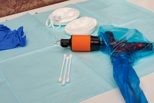 The apparatus for applying a tattoo on the lips. High quality photo