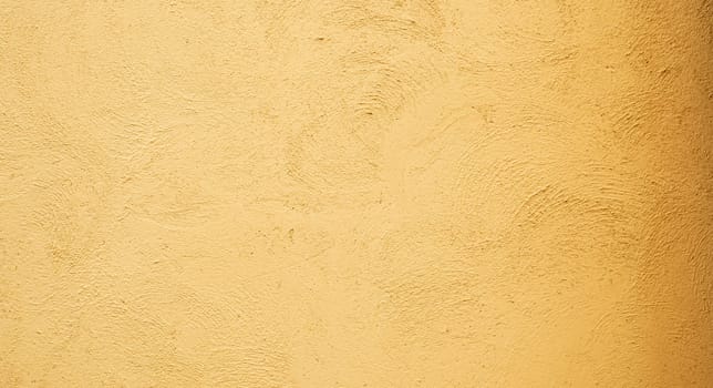 Abstract background from stucco concrete wall with sunlight, light and shadow