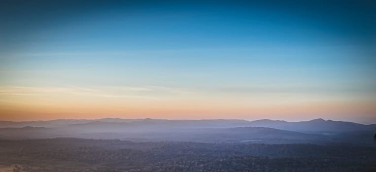 Panorama of a beautiful landscape with mountain ranges at sunset.  At Khao Yai National Park Thailand