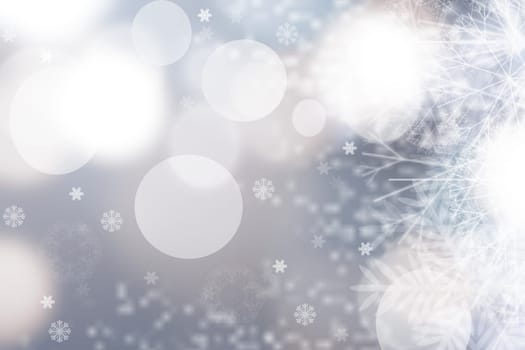 Abstract blurred festive winter christmas or Happy New Year background with shiny blue and white bokeh lighted snow landscape. Space for your design. Card concept.