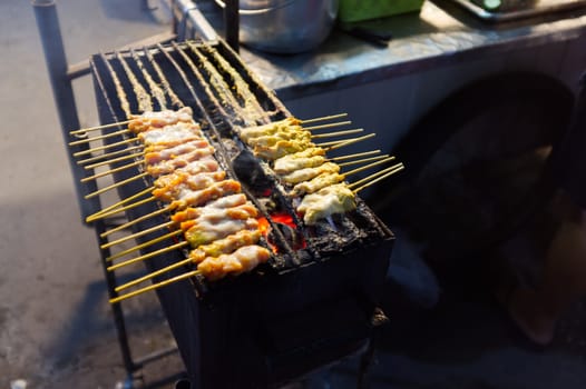 THAI FOOD , Pork Satay on stove .