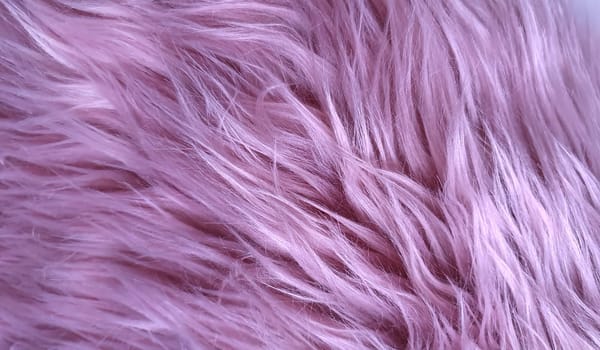 Pink natural fur background texture for design