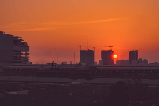 Panorama of capital city. Cityscape at sunset colorful cloudy twilight sky