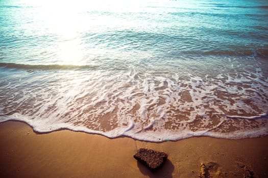 Soft Blue Waves on the beach at the summer time. sea beach blue sky sand sun daylight relaxation landscape viewpoint. The color of the water and beautifully bright clear water.