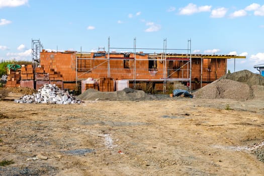 Area from single family house construction with building rails and gravel.