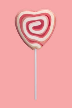 Pink and white swirl Lollipop isolated over pink background