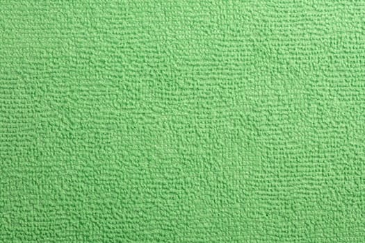 Microfiber Towel green Terry Texture Wrist Watch. Microfiber cloth with close-up. Fabric structure background. Fabric blue pattern. Cleaning service. Macro object.