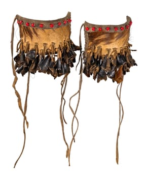 Dance rattle of the North American Indians made of rawhide, deerskin and deer hooves to attach to the legs, isolated on white