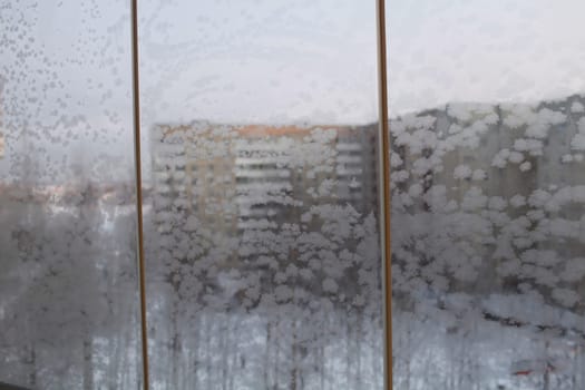 frosty patterns on window panes in winter