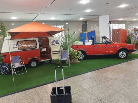 DUESSELDORF, NRW, GERMANY - SEPTEMBER 04, 2019:.Motorhomes and campers for sale or rent at an exhibition. Concept freedom, family vacation trip, holiday trip with camper.
