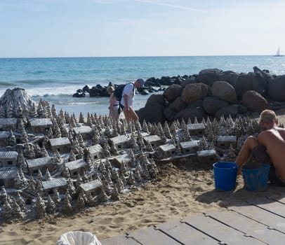 CRAN CANARIA, MELONERAS - NOVEMBER 13, 2019:.Christmas Village of sand on the beach of Cran Canaria in Meloneras