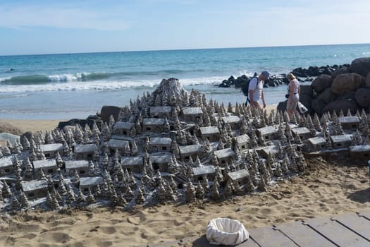 CRAN CANARIA, MELONERAS - NOVEMBER 13, 2019:.Christmas Village of sand on the beach of Cran Canaria in Meloneras