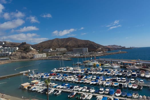 CRAN CANARIA, PUERTO RICO - NOVEMBER 16, 2019:.Marina in Puerto Rico de Gran Canaria. Postcard, spain.