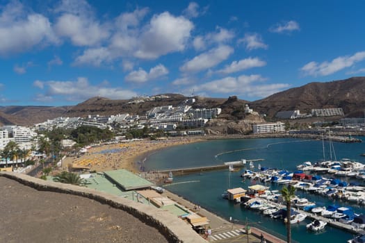 CRAN CANARIA, PUERTO RICO - NOVEMBER 16, 2019:.Marina in Puerto Rico de Gran Canaria. Postcard, spain.