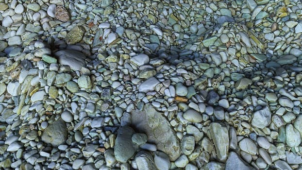 Realistic beach terrain with blurred sea of mounds of stones 3D render with convex curvatures and irregularities. Piles of small and large pebbles lying in random order and crumbling.