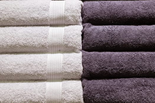 Stack of fluffy towels in store. Background.