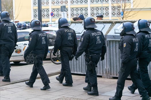 Police security forces during protests by opponents of the Corona measures and compulsory vaccination in downtown Magdeburg in Germany